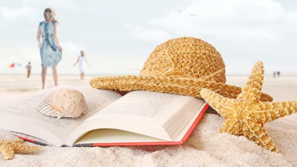 Imagine cu cărți relaxante pentru citit în vacanță pe plajă